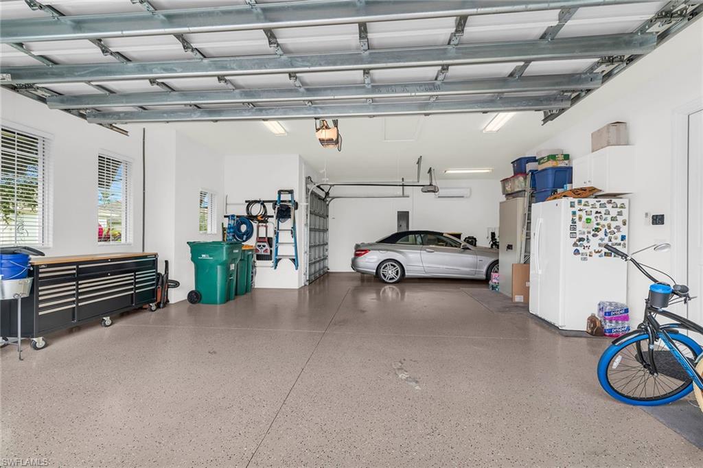 14812 Dockside Lane Naples, FL 34114 - Photo 27 of 49 a view of car garage