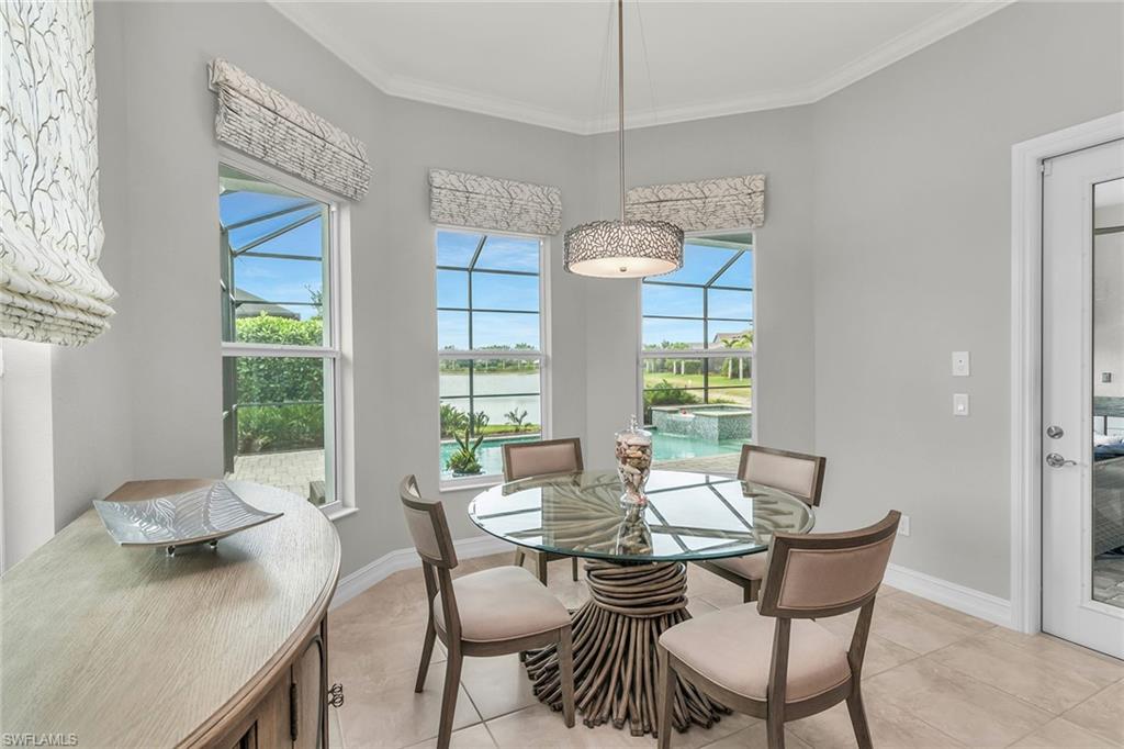 14812 Dockside Lane Naples, FL 34114 - Photo 3 of 49 a view of a dining room with furniture window and outside view