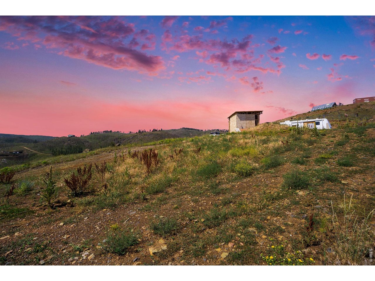a view of a city with sunset
