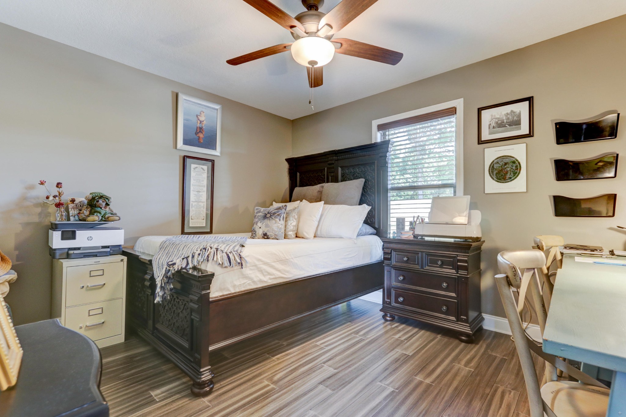 7429 Lakeshore Drive Rutledge, TN 37861 - Photo 17 of 38 a bedroom with a bed and a chandelier