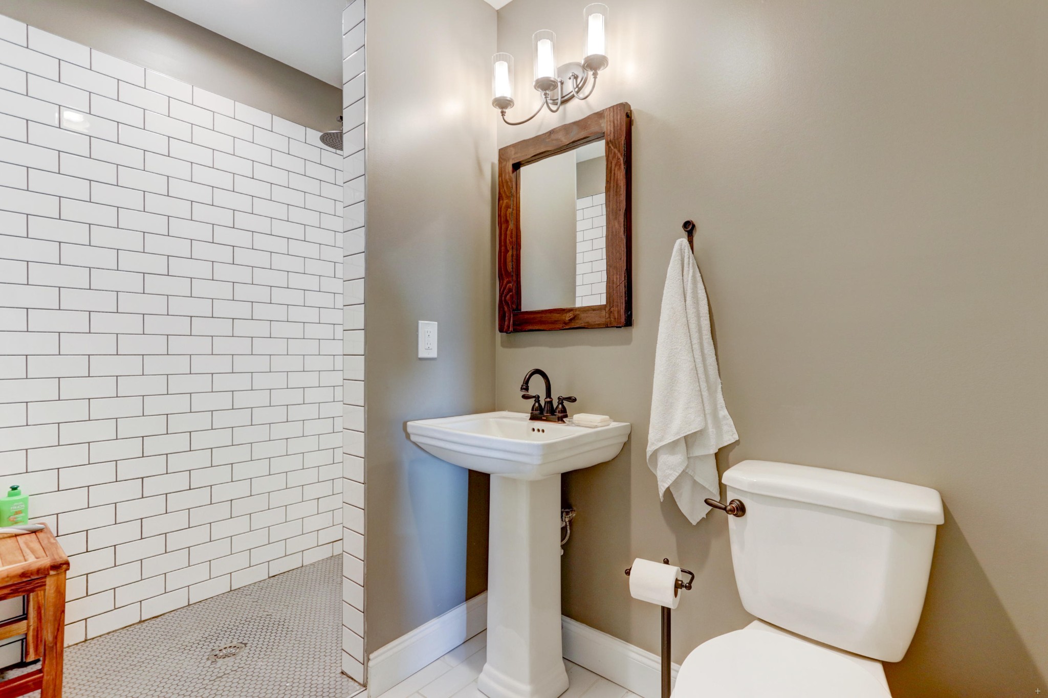 7429 Lakeshore Drive Rutledge, TN 37861 - Photo 18 of 38 a bathroom with a toilet sink and mirror