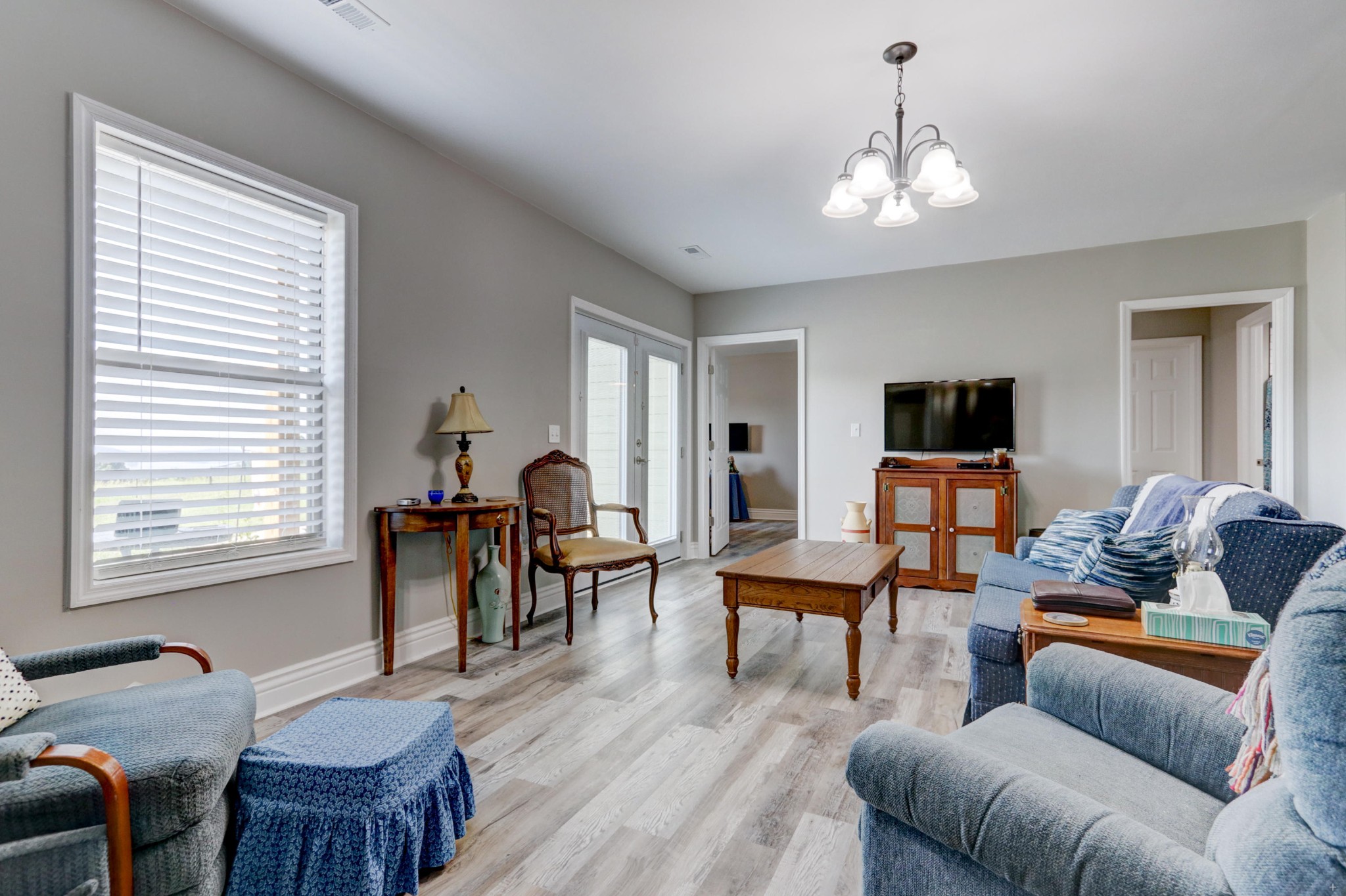 7429 Lakeshore Drive Rutledge, TN 37861 - Photo 20 of 38 a living room with furniture a dining table and a window