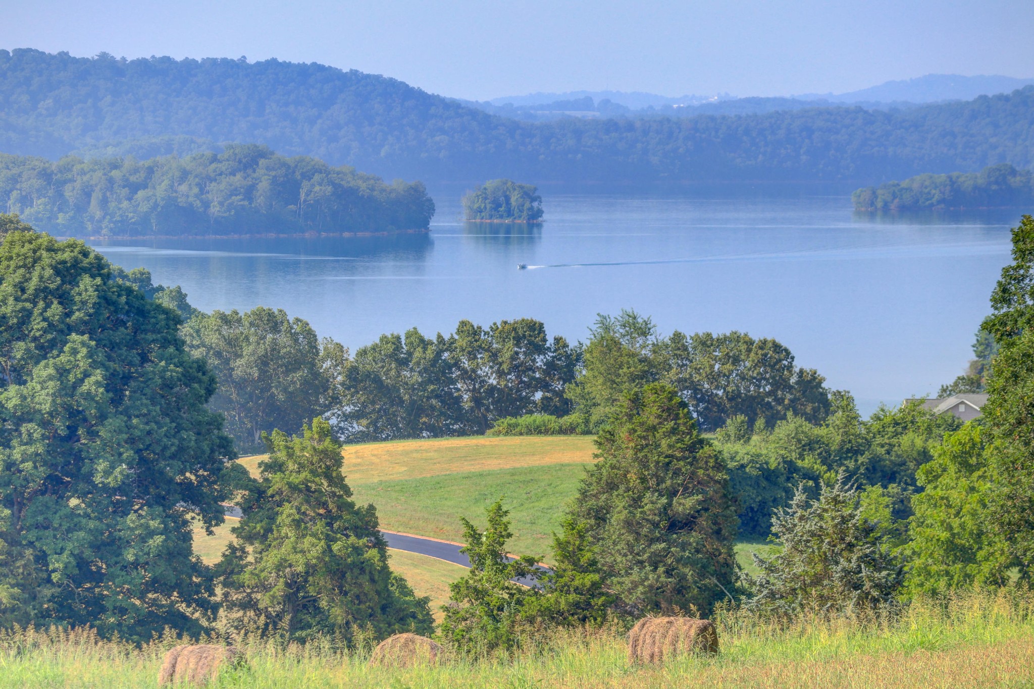 7429 Lakeshore Drive Rutledge, TN 37861 - Photo 2 of 38 a view of a lake with a mountain in the background