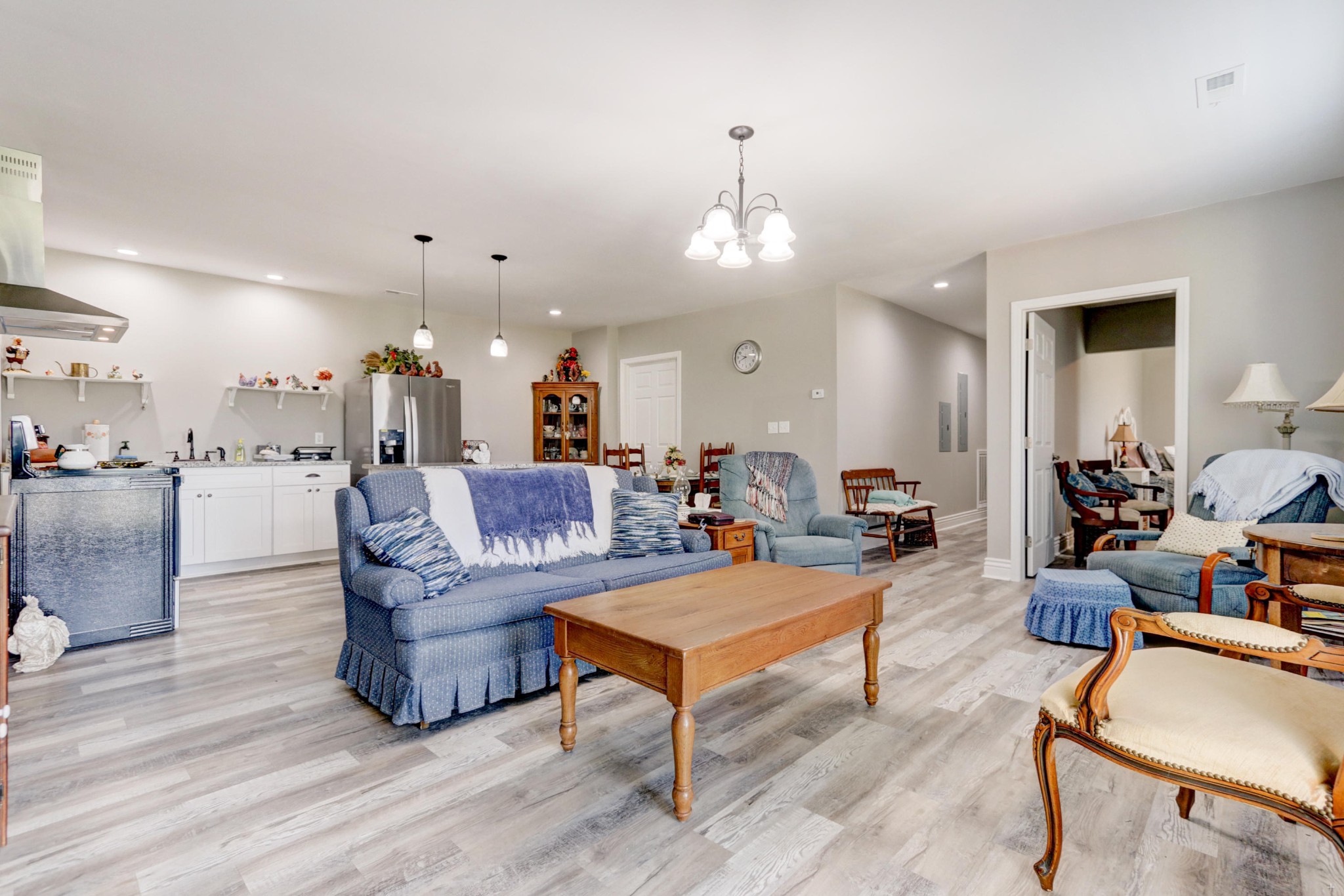 7429 Lakeshore Drive Rutledge, TN 37861 - Photo 21 of 38 a living room with furniture kitchen view and a wooden floor