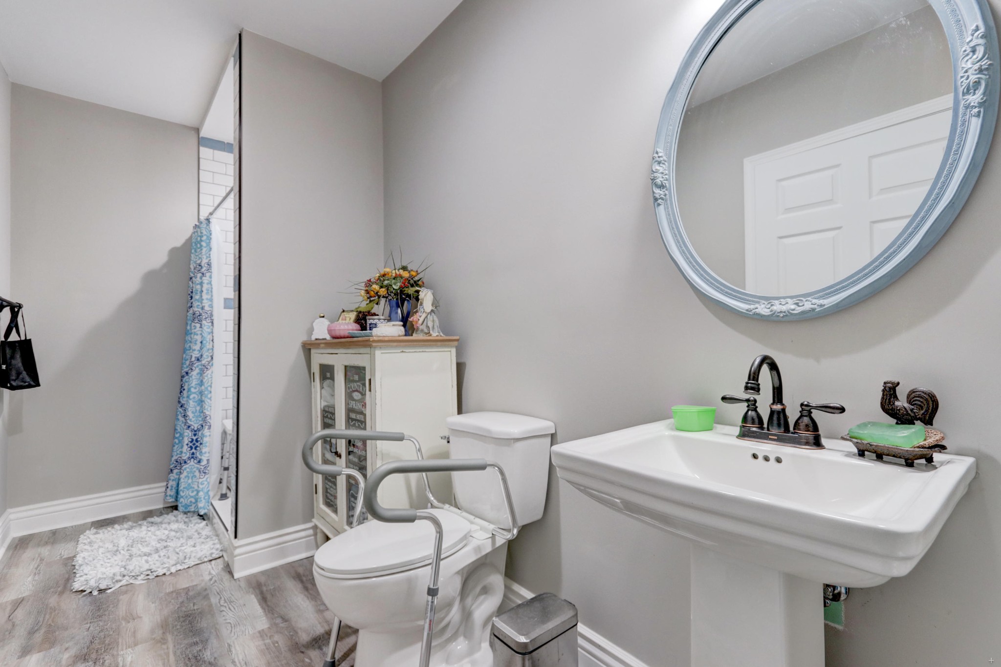 7429 Lakeshore Drive Rutledge, TN 37861 - Photo 27 of 38 a bathroom with a sink a toilet and a mirror