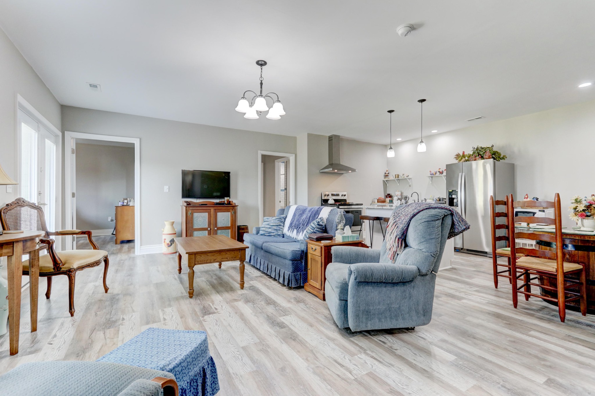 7429 Lakeshore Drive Rutledge, TN 37861 - Photo 30 of 38 a living room with furniture kitchen view and a flat screen tv