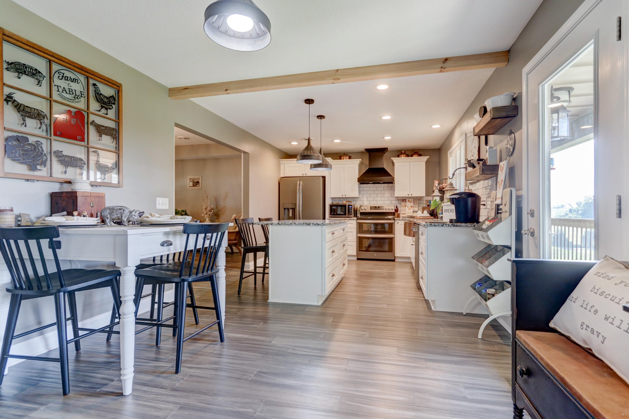 7429 Lakeshore Drive Rutledge, TN 37861 - Photo 8 of 38 a living room with stainless steel appliances furniture wooden floor and a kitchen view