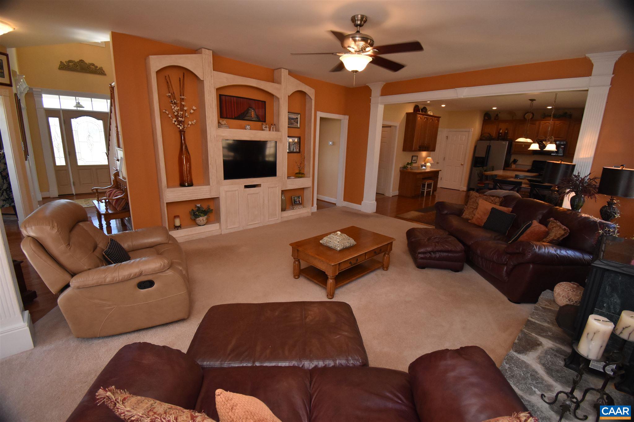 285 March Road Stanardsville, VA 22973 - Photo 13 of 75 a living room with furniture and a flat screen tv