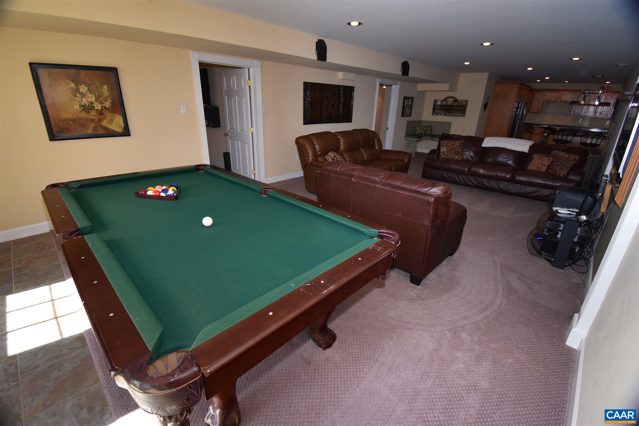 285 March Road Stanardsville, VA 22973 - Photo 45 of 75 a room with furniture and a flat screen tv