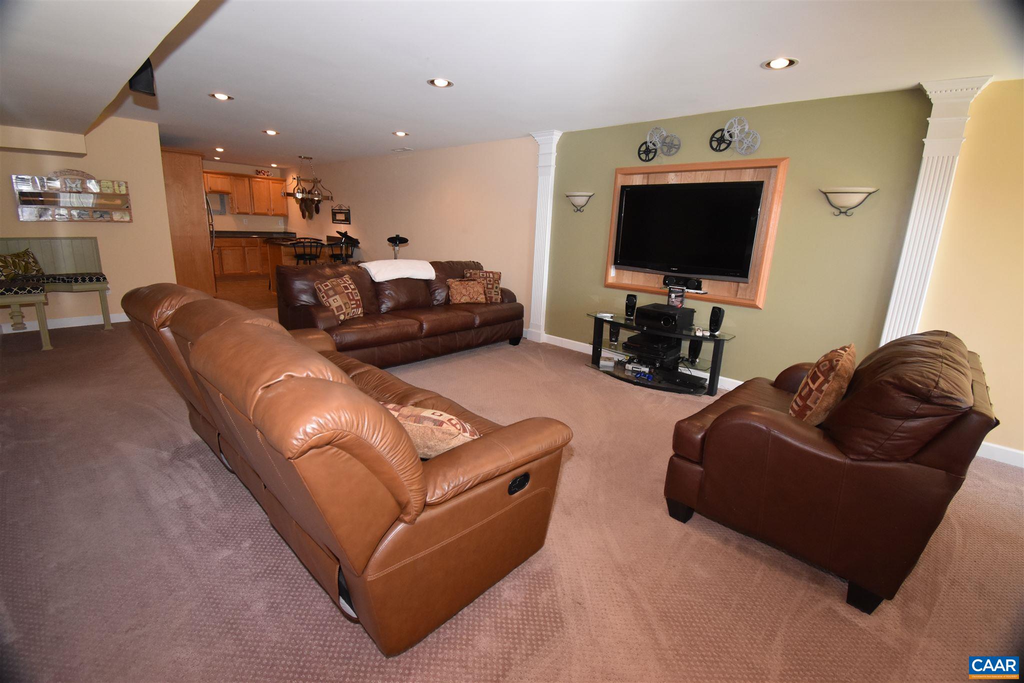 285 March Road Stanardsville, VA 22973 - Photo 46 of 75 a living room with furniture and a flat screen tv