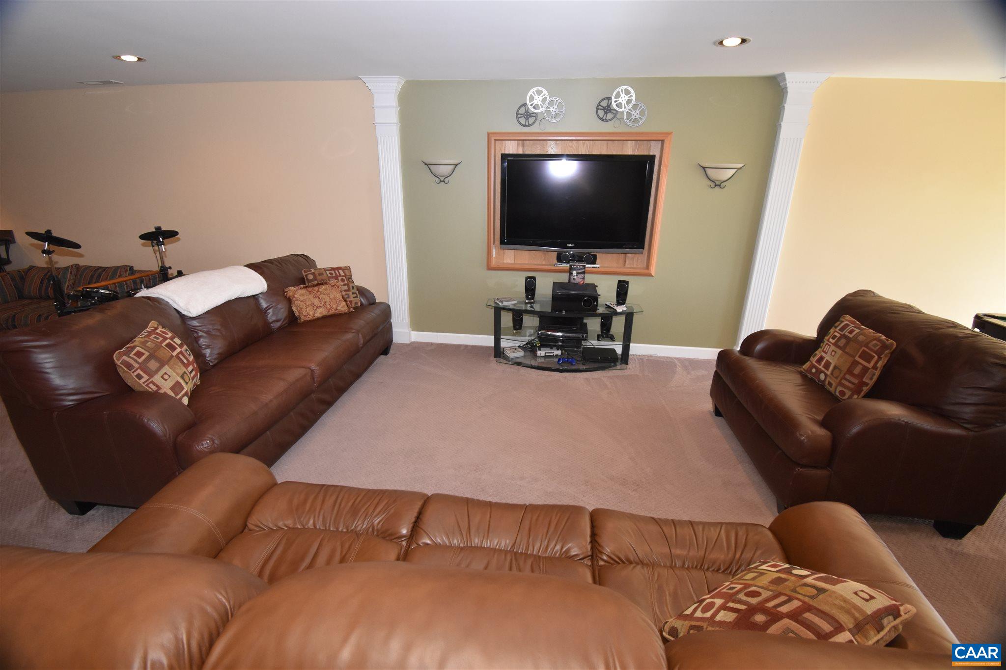 285 March Road Stanardsville, VA 22973 - Photo 50 of 75 a living room with furniture and a flat screen tv