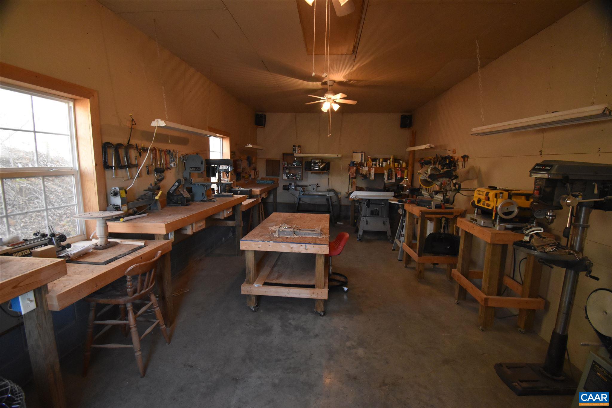 285 March Road Stanardsville, VA 22973 - Photo 60 of 75 a room with gym equipment and a large window