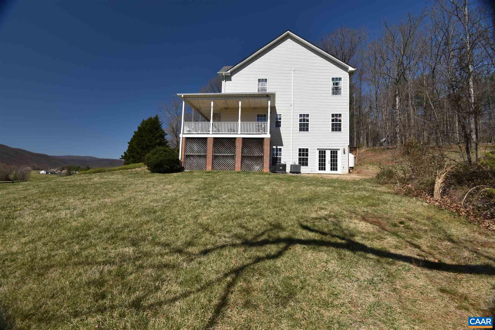285 March Road Stanardsville, VA 22973 - Photo 61 of 75 a view of a house with a yard