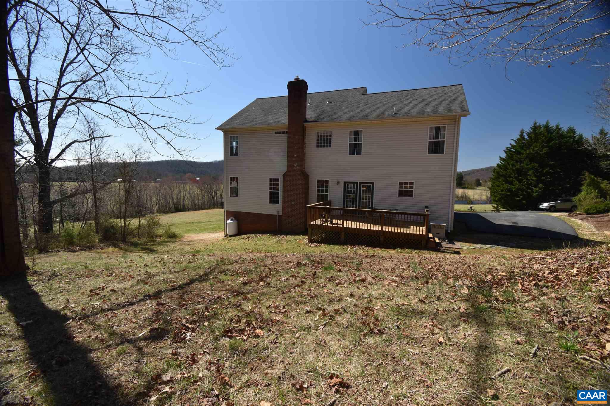 285 March Road Stanardsville, VA 22973 - Photo 62 of 75 a front view of a house with a yard