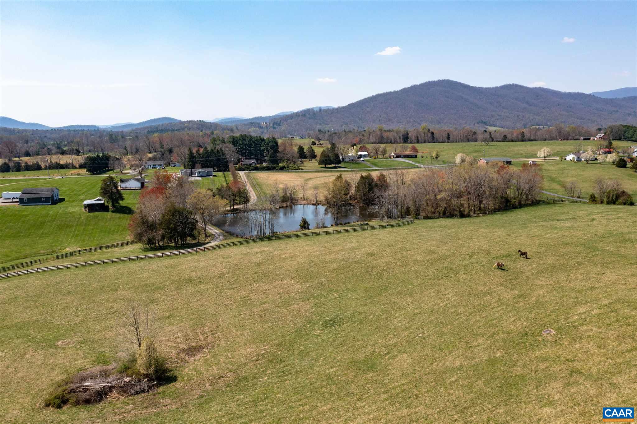 285 March Road Stanardsville, VA 22973 - Photo 75 of 75 a view of a lake with mountains in the background