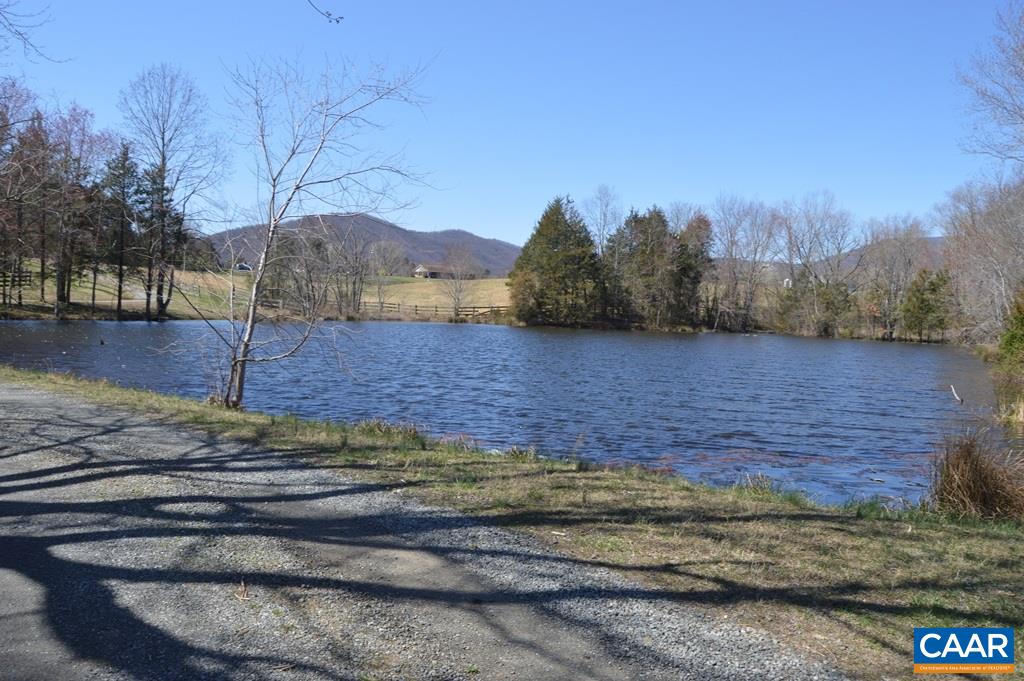 285 March Road Stanardsville, VA 22973 - Photo 9 of 75 a view of a backyard with wooden fence
