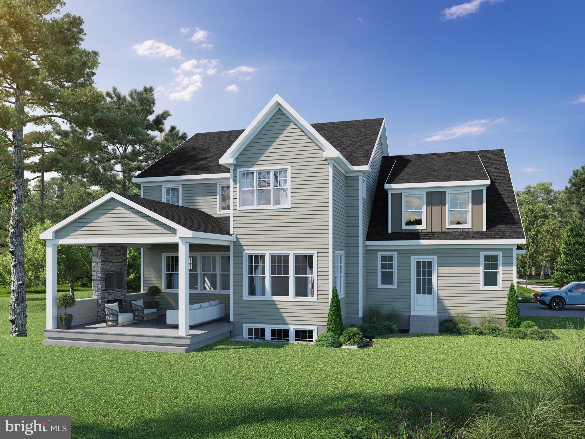 353 Oak Terrace Wayne, PA 19087 - Photo 8 of 13 a front view of a house with a yard potted plants and large tree