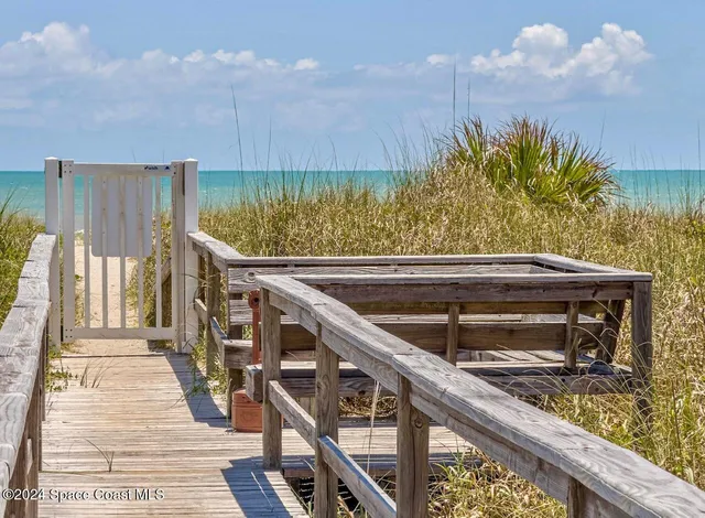 a view of a livingroom with furniture and window