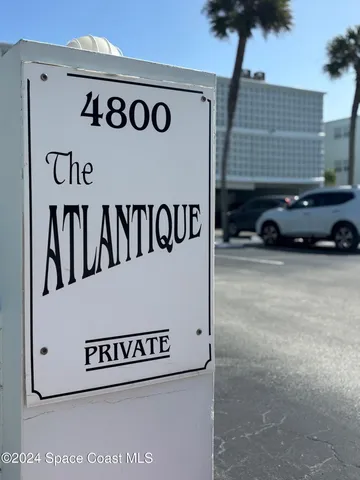 a view of a house with a swimming pool
