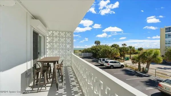 a balcony with an outdoor space