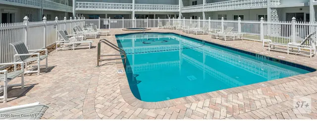 a balcony with an outdoor space