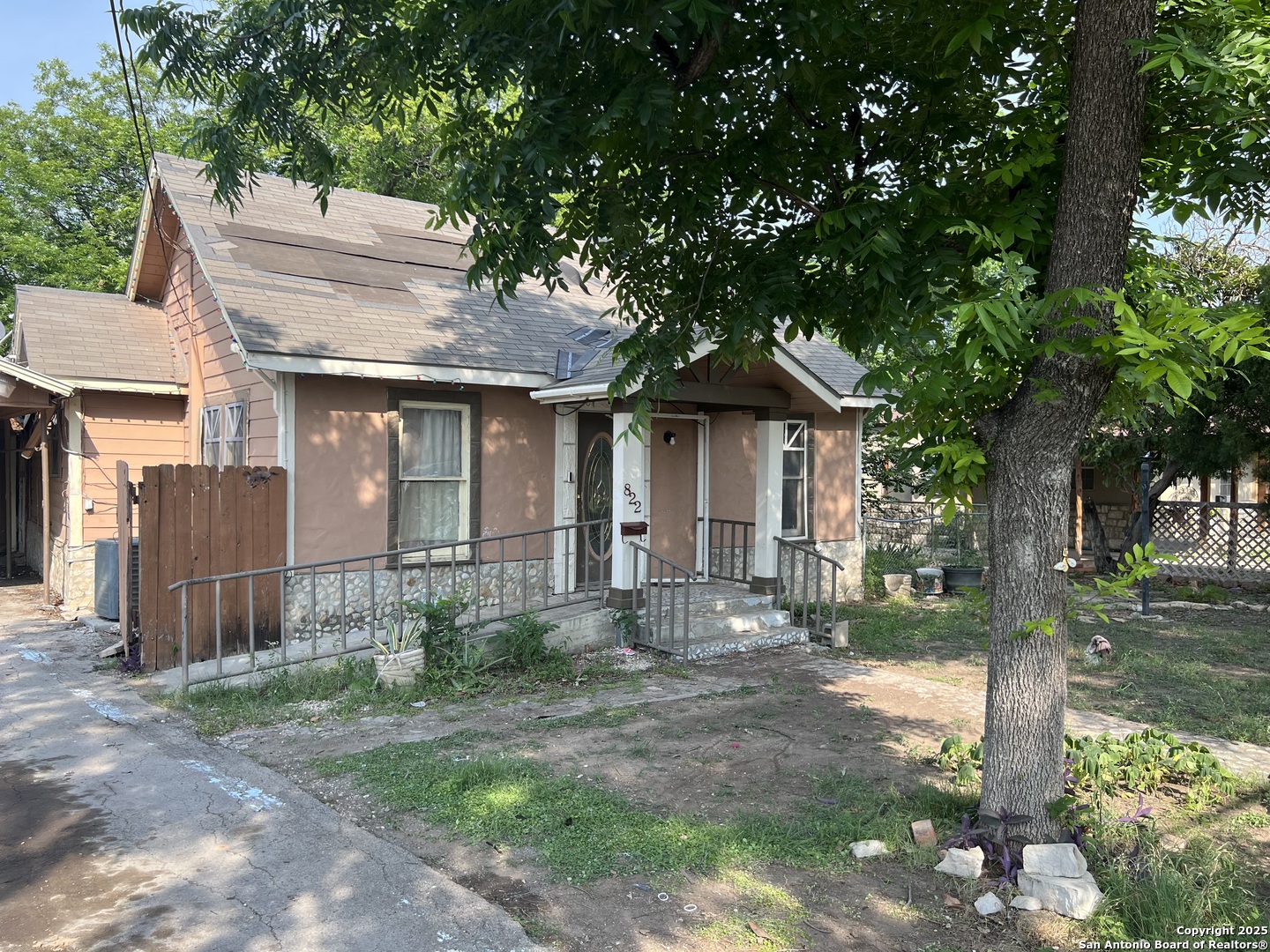 822 North High Street Uvalde, TX 78801 - Photo 14 of 14 a front view of a house with garden