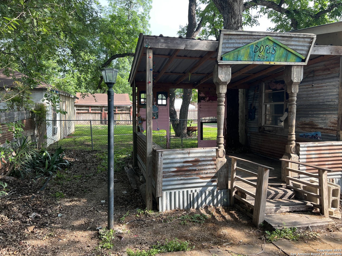 822 North High Street Uvalde, TX 78801 - Photo 3 of 14 a view of a house with a small garden
