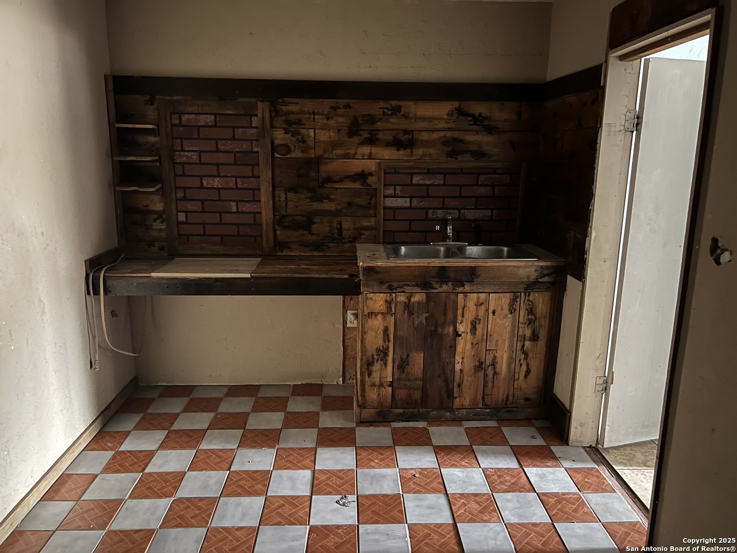 822 North High Street Uvalde, TX 78801 - Photo 6 of 14 a view of a storage & utility room