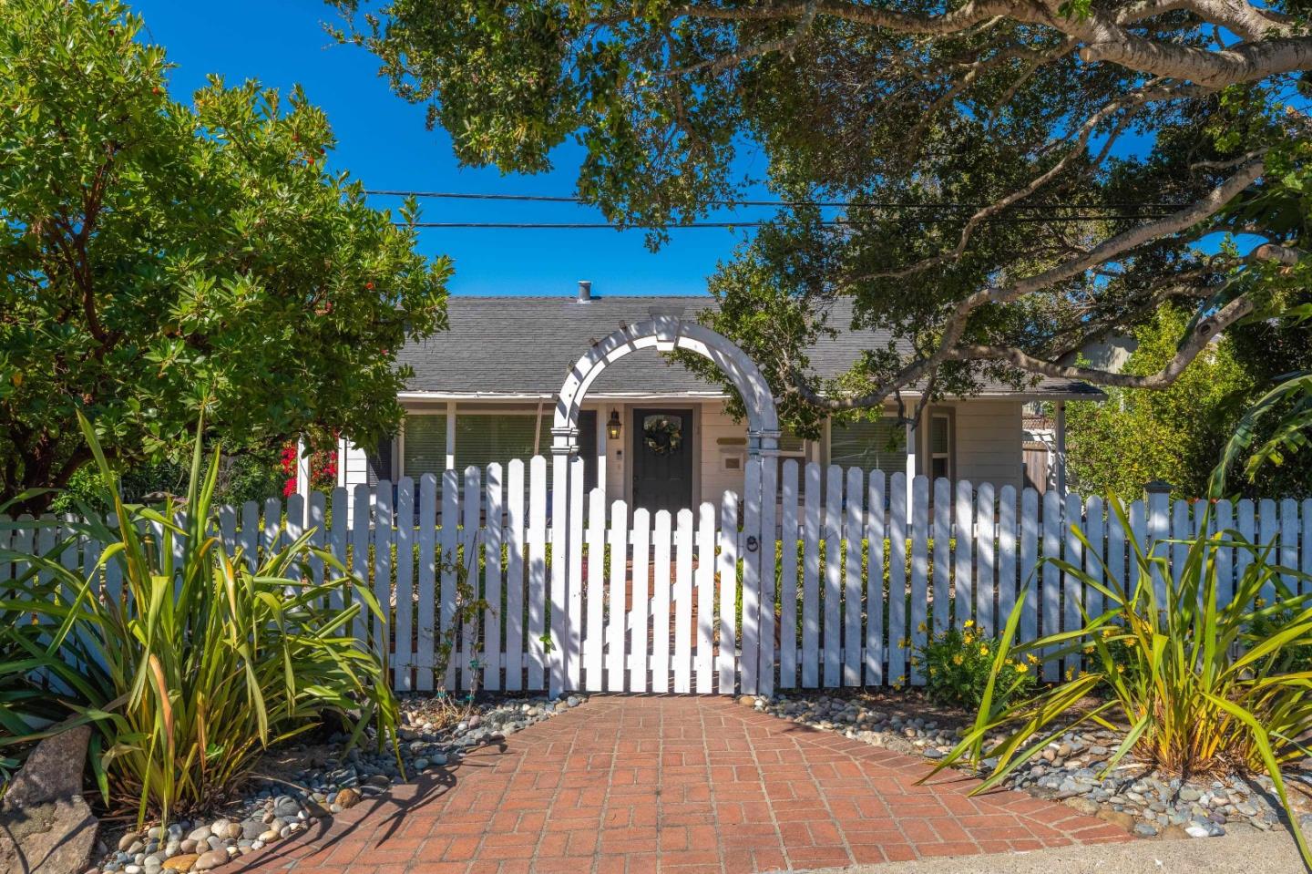 1 Serrano Way Del Rey Oaks, CA 93940 - Photo 14 of 47 a front view of a house with a garden