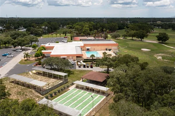 a view of a balcony with an outdoor space and seating area