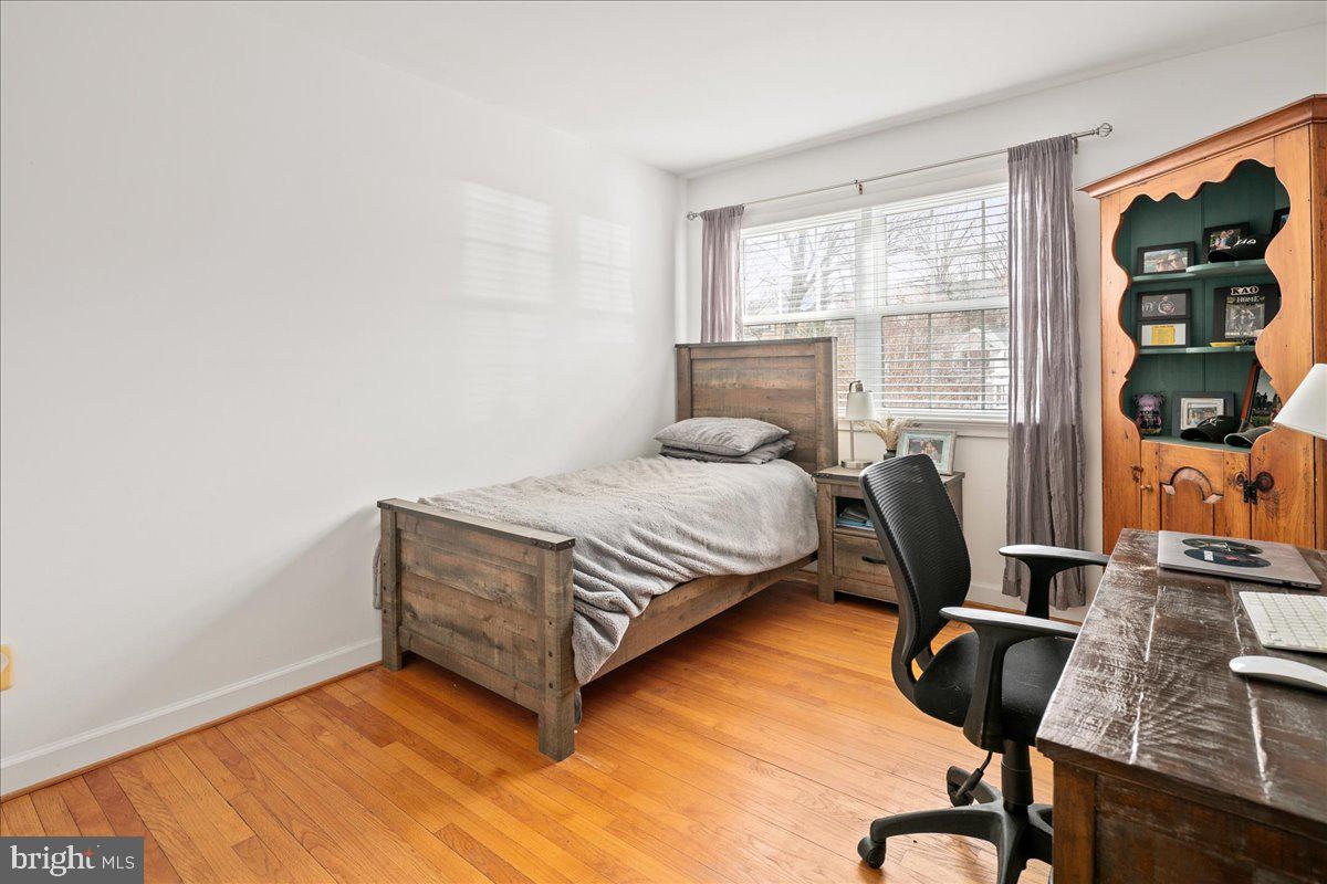3012 Russell Road Alexandria, VA 22305 - Photo 30 of 56 a bedroom with a bed and a window