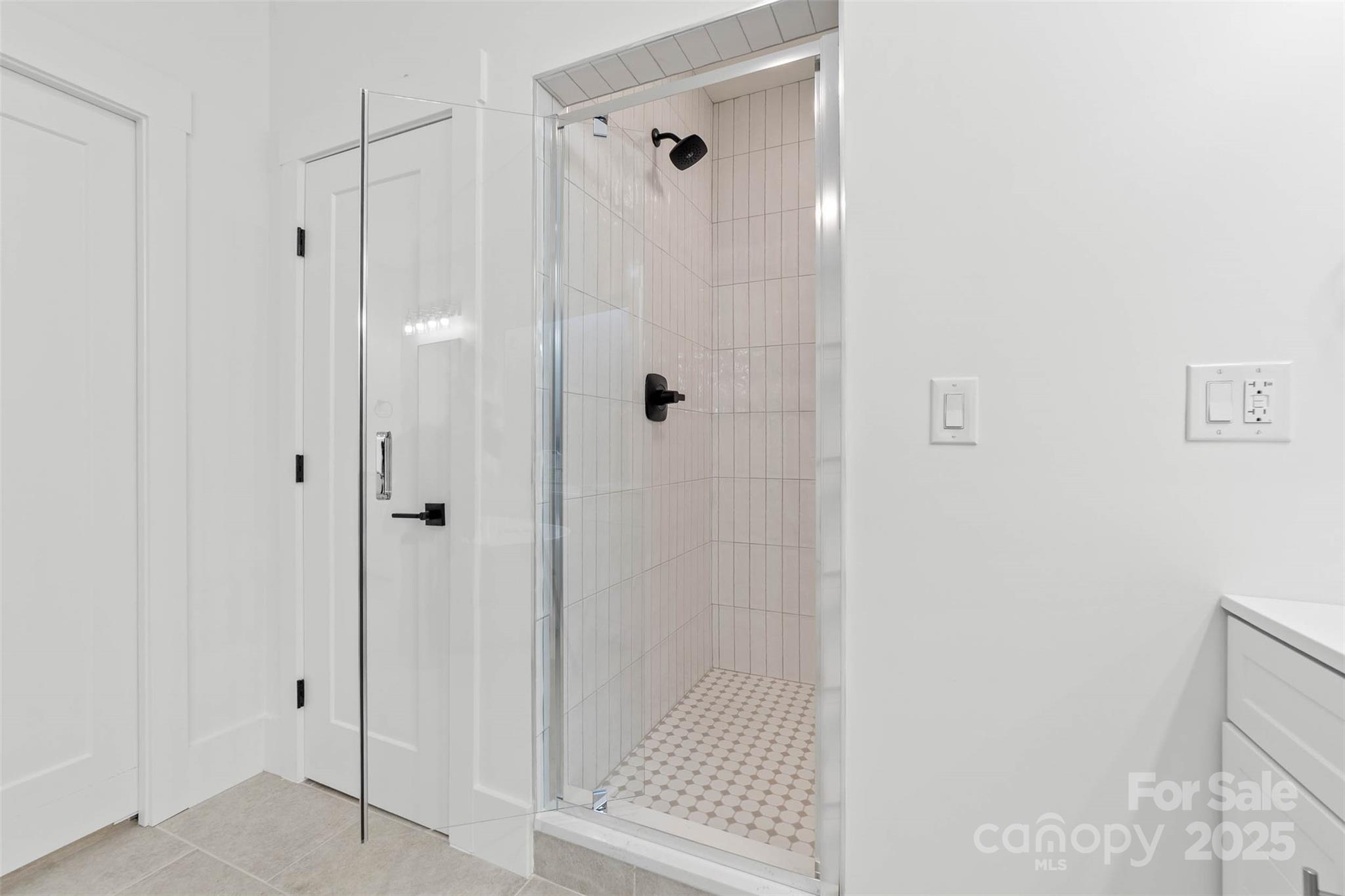 2102 Whitworth Road Cherryville, NC 28021 - Photo 22 of 34 a bathroom with a glass shower door