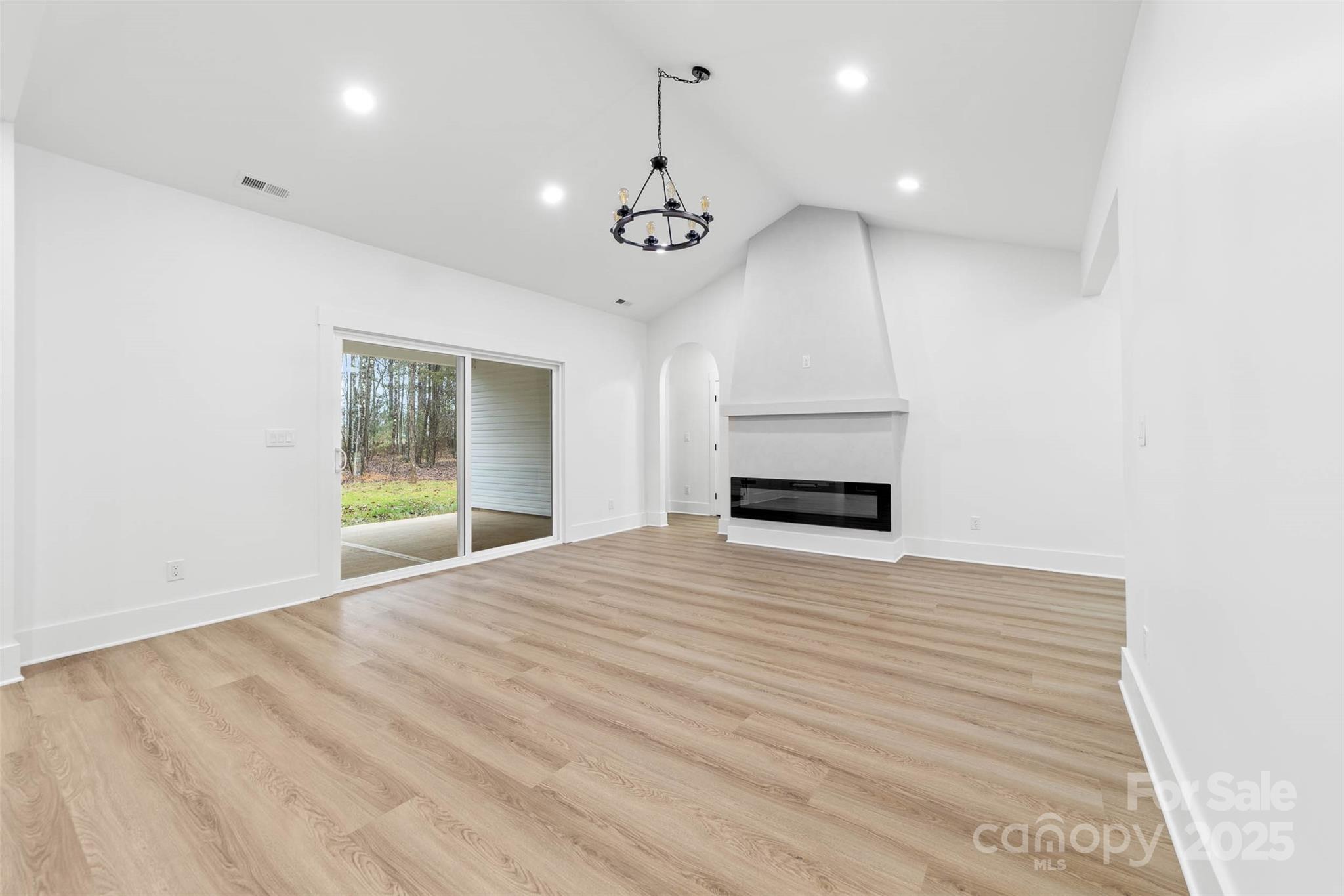 2102 Whitworth Road Cherryville, NC 28021 - Photo 34 of 34 a view of an empty room with a window and kitchen view