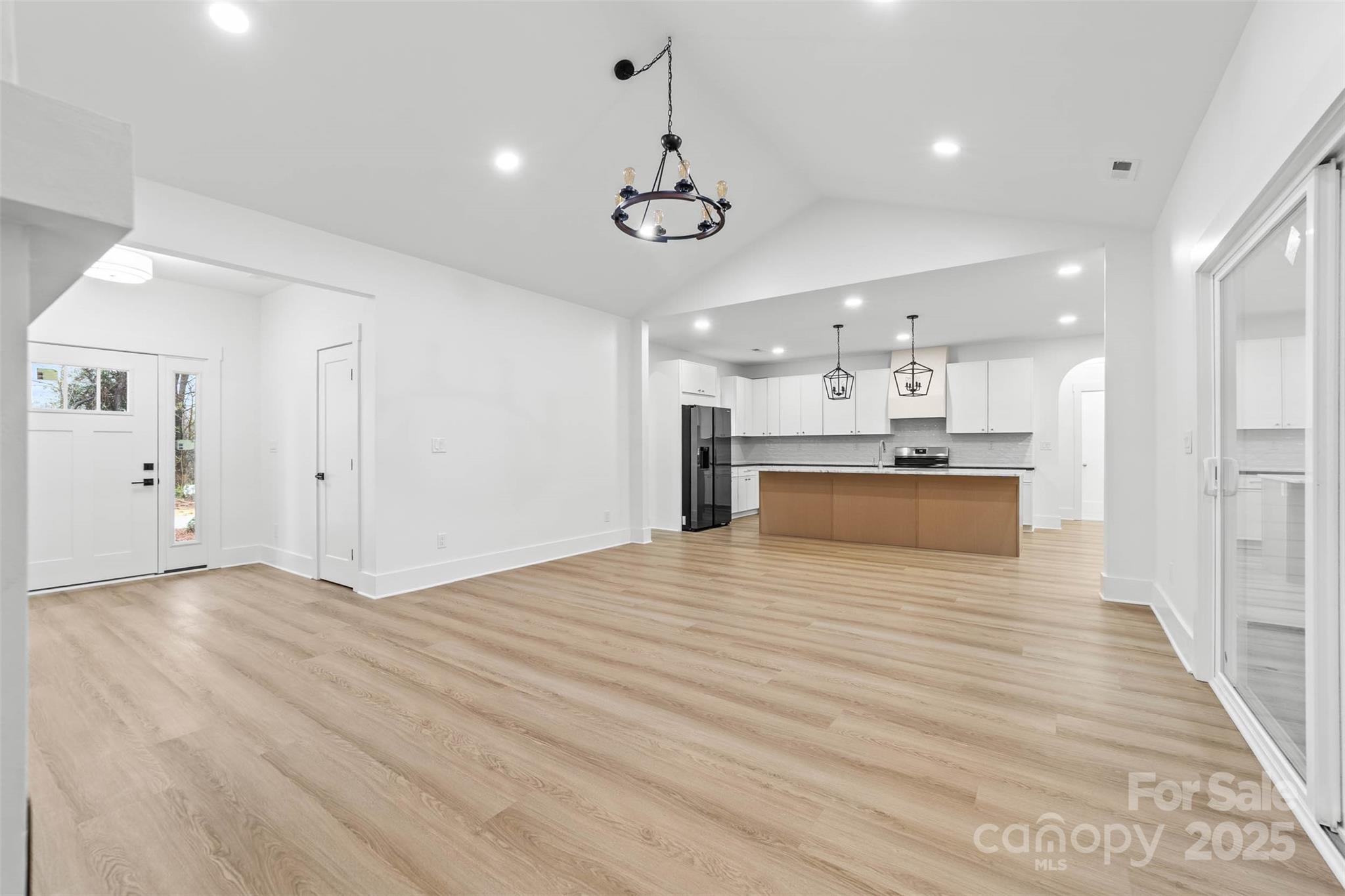 2102 Whitworth Road Cherryville, NC 28021 - Photo 9 of 34 a view of a kitchen with a stove cabinets and wooden floor