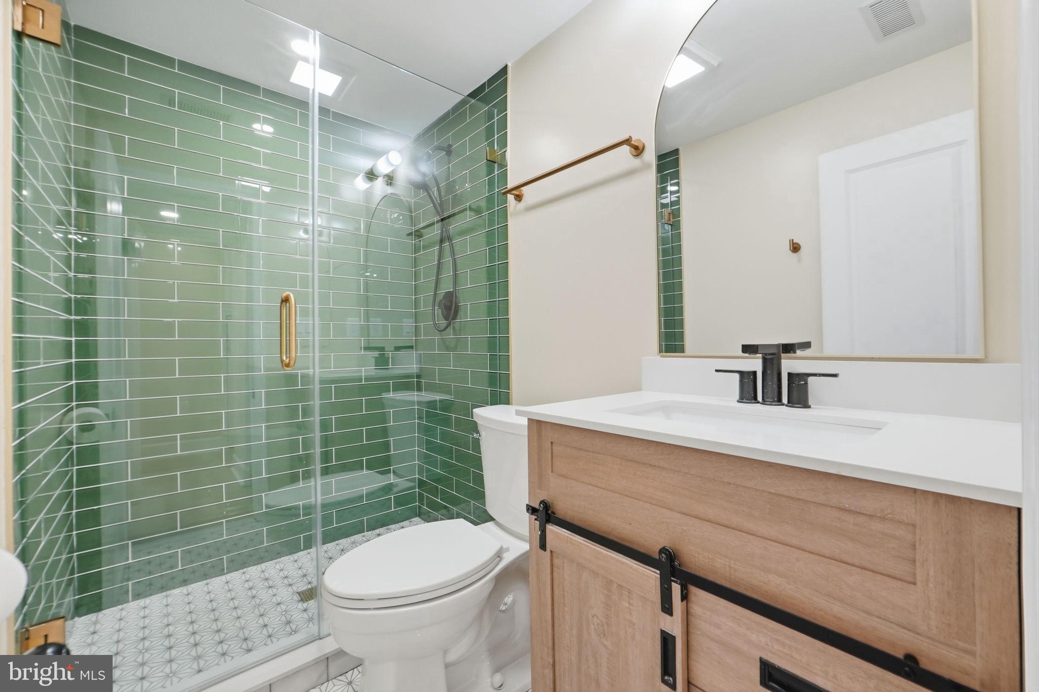518 Columbia Road Northwest Washington, DC 20001 - Photo 31 of 35 Sleek bathroom with modern accents.