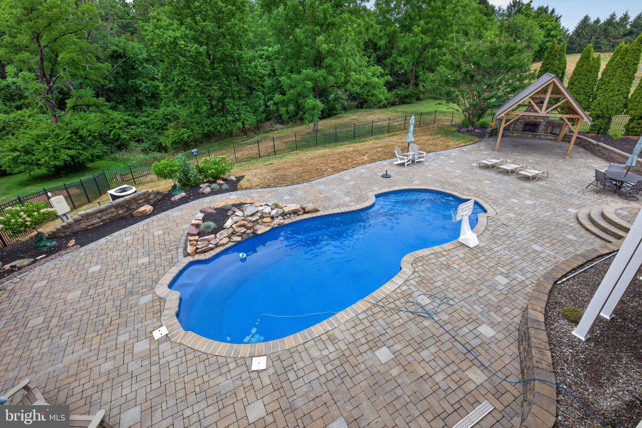 6505 Plowman Ridge Harrisburg, PA 17112 - Photo 66 of 83 Serene backyard oasis with pool.