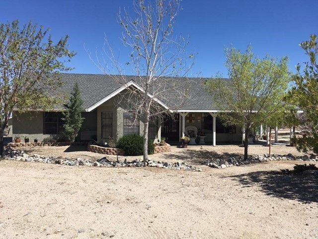 1404 Walnut Road Pinon Hills, CA 92372 - Photo 1 of 1 a view of a house with snow on the road