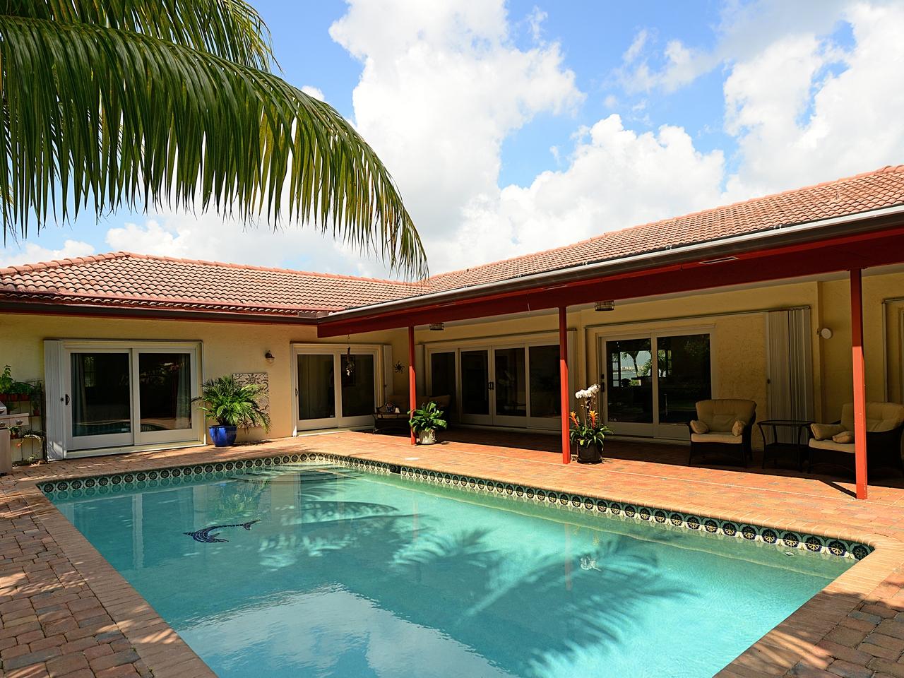 1131 Pine Point Road Singer Island, FL 33404 - Photo 27 of 34 Pool / Exterior Back