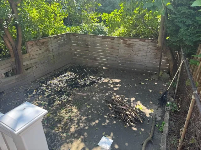 a bathroom with a sink toilet and a mirror