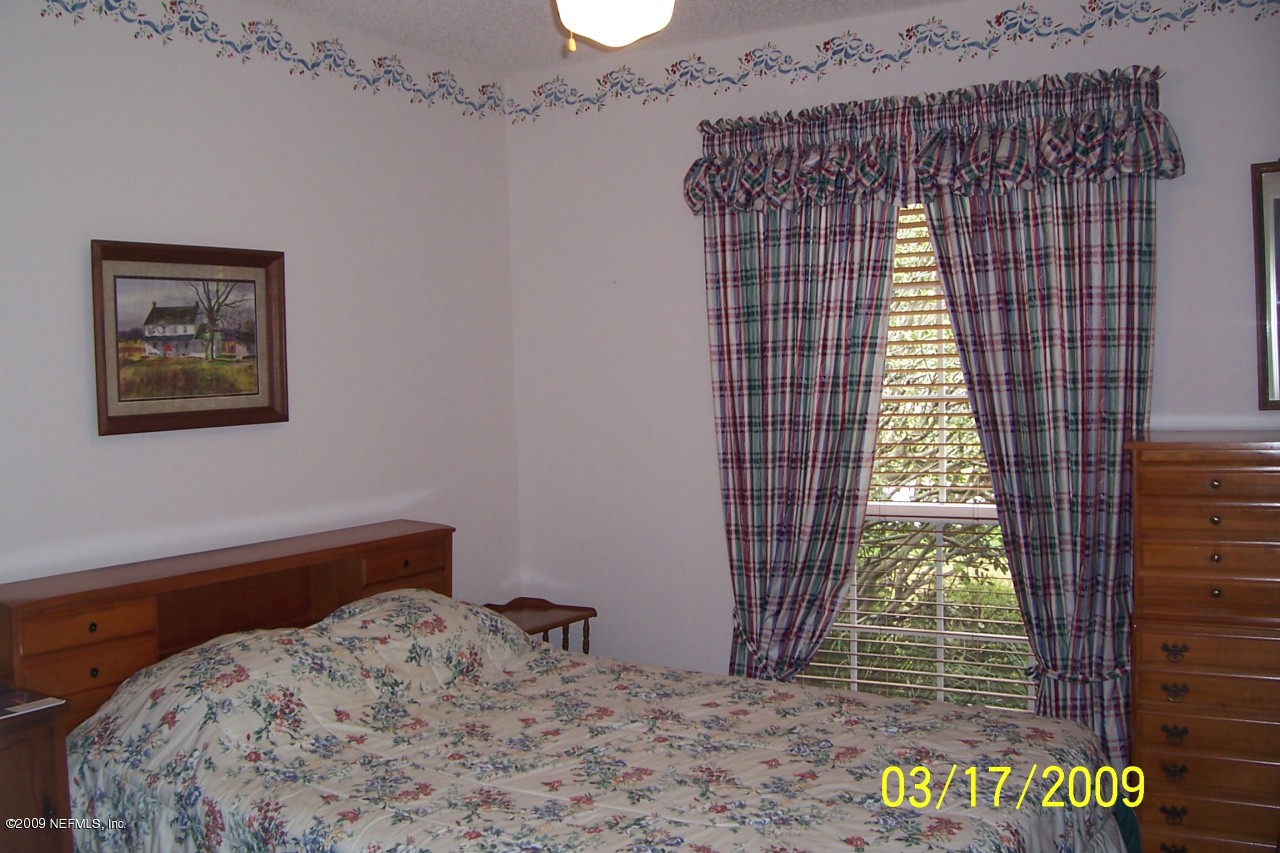 1524 Marsh Rabbit Way Orange Park, FL 32003 - Photo 8 of 11 Guest Bedroom