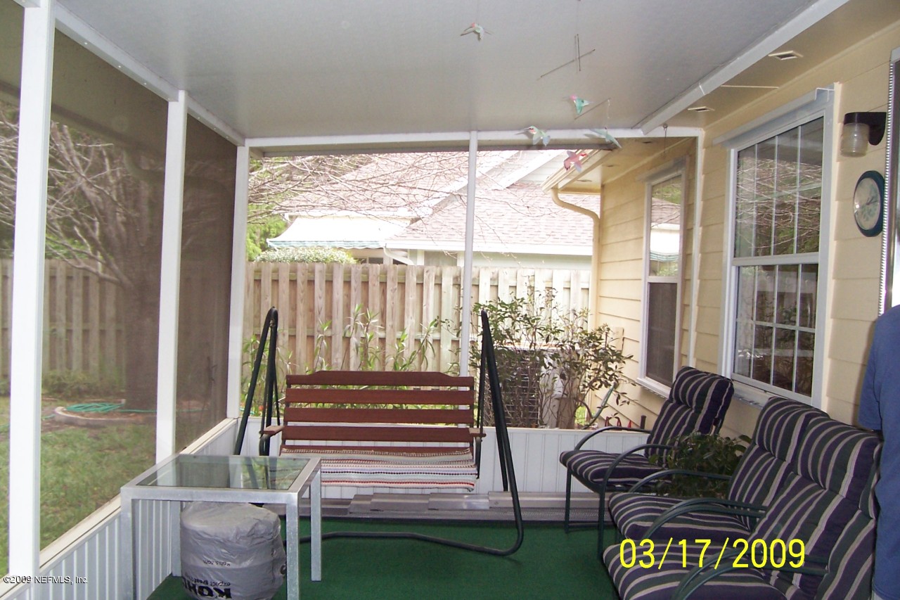 1524 Marsh Rabbit Way Orange Park, FL 32003 - Photo 10 of 11 Screened Porch
