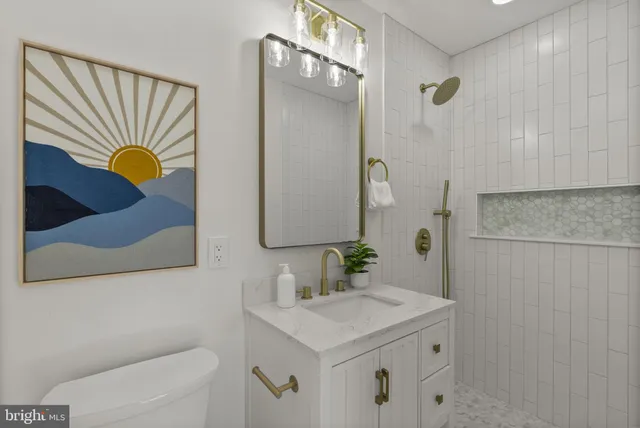 a bedroom with a bed and a chair