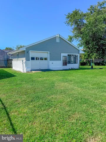 a picture of a bench in front of a window