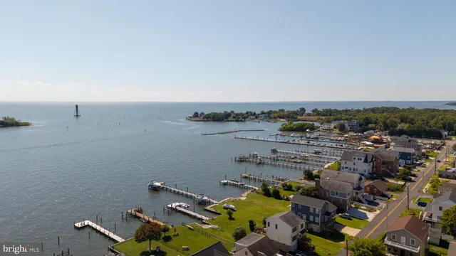 a view of a swimming pool and a yard