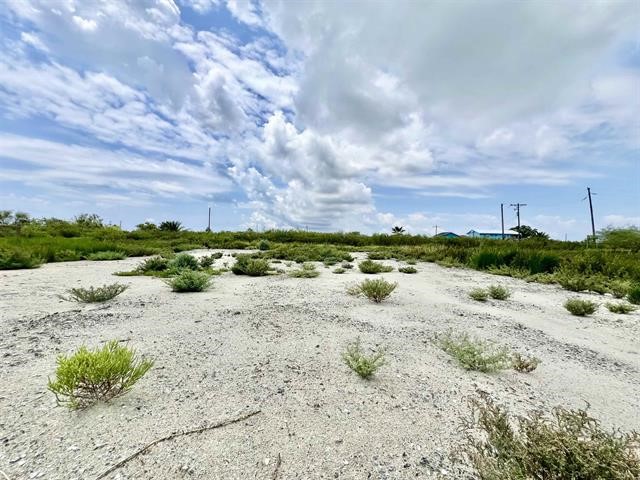 1205 West Canal Crystal Beach Crystal Beach, TX 77650 - Photo 5 of 7 a view of a lake with beach