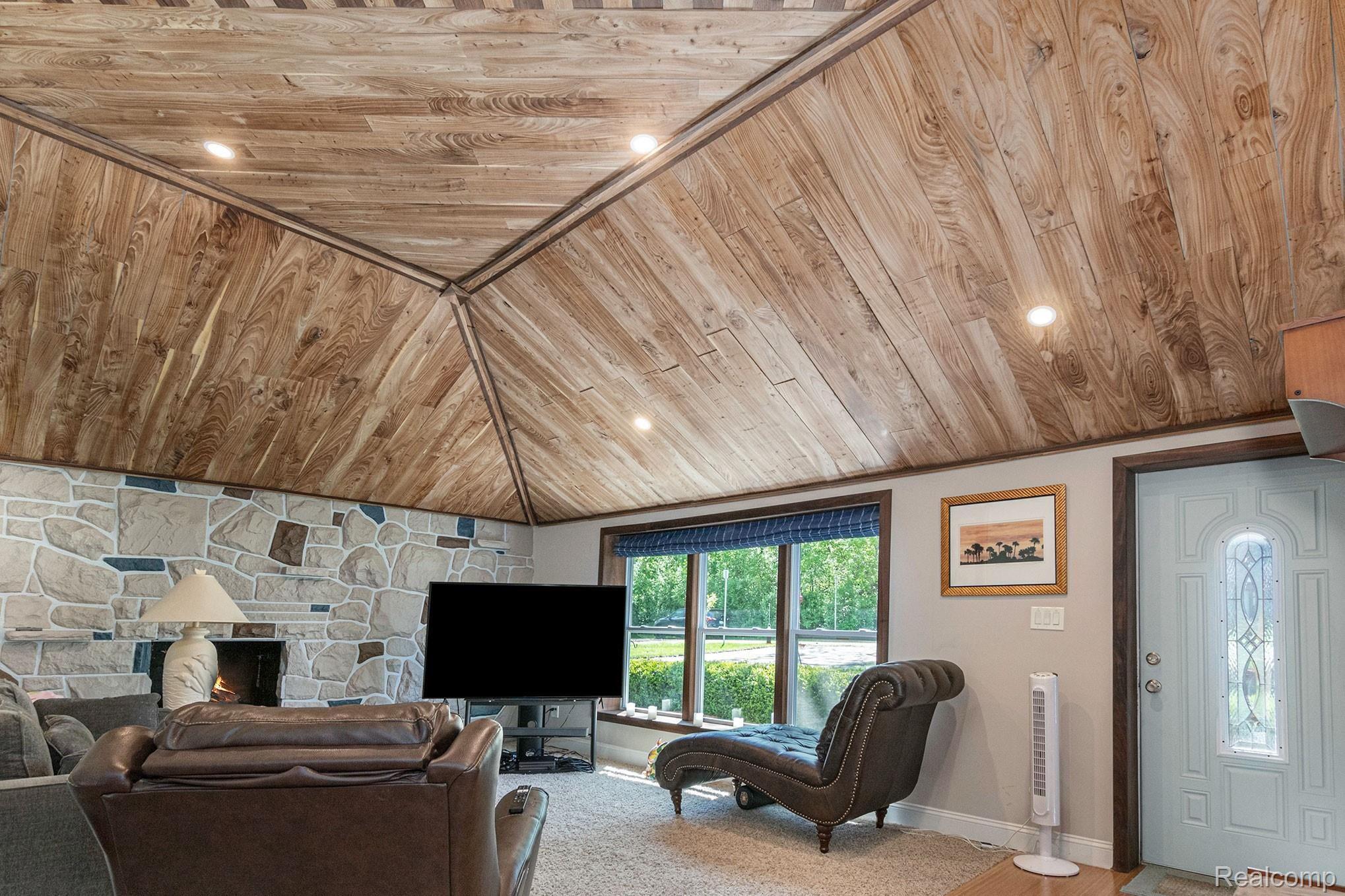 1155 Michelson Road Rochester, MI 48307 - Photo 12 of 36 Family room with rare Siberian Elm Wood ceiling.