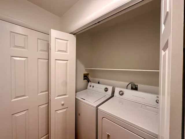 a utility room with dryer and washer