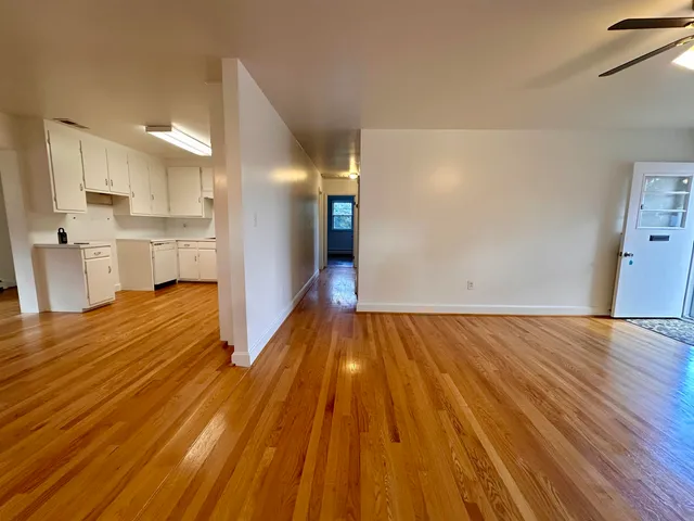 a view of a kitchen from the hallway
