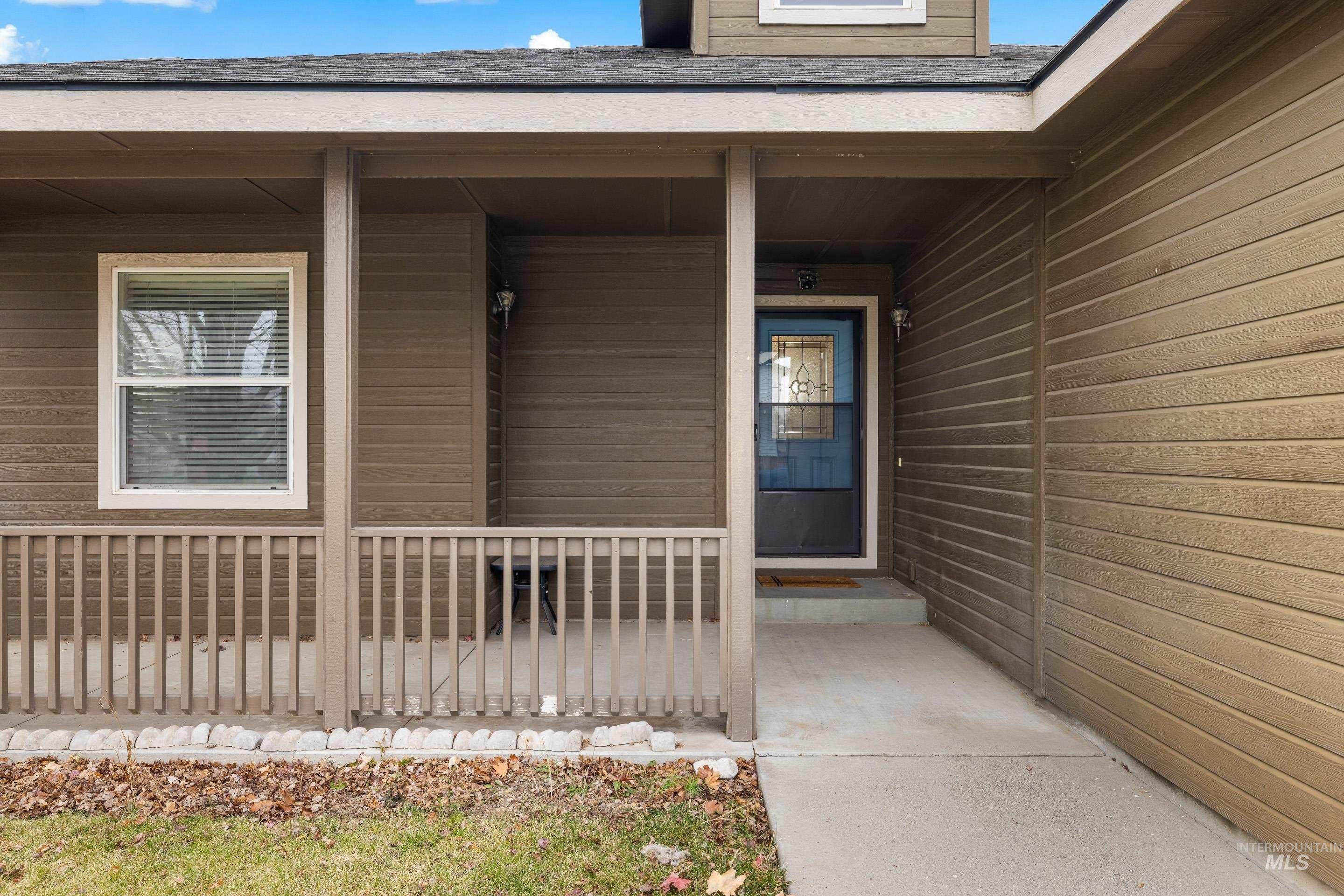 191 Southwest Quaker Drive Mountain Home, ID 83647 - Photo 5 of 43 Entrance to property with a porch and roof with shingles