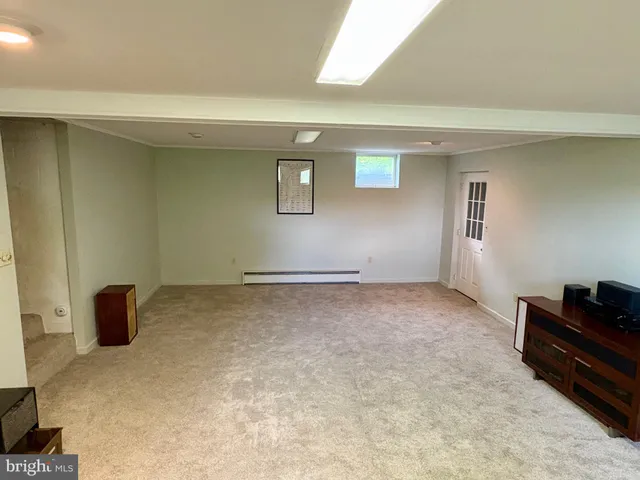 a view of a livingroom with workspace